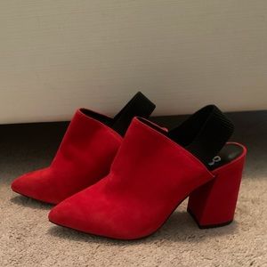 Red pointed toe block heel mules